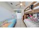 Bedroom with bunk beds, flat screen tv, and fun decor at 194 Larkspur Ct, Kissimmee, FL 34743