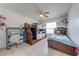 Bedroom with bunk beds, desk, and lots of natural light at 194 Larkspur Ct, Kissimmee, FL 34743