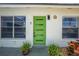 A close up of the bright green front door at 194 Larkspur Ct, Kissimmee, FL 34743