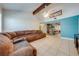 Spacious living room featuring a comfortable sectional sofa and a bright, airy atmosphere at 194 Larkspur Ct, Kissimmee, FL 34743