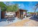 Outdoor patio with a grill, shed, and furniture at 194 Larkspur Ct, Kissimmee, FL 34743