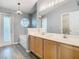 Bathroom boasting dual sinks, tub, and plenty of counter space at 1961 Lochshyre Loop, Ocoee, FL 34761