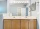 Bathroom showcasing dual sinks and vanity with ample counter space at 1961 Lochshyre Loop, Ocoee, FL 34761