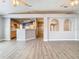 Spacious living room area with views of the kitchen at 1961 Lochshyre Loop, Ocoee, FL 34761