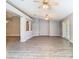Bright and spacious living room with laminate floor and backyard view at 1961 Lochshyre Loop, Ocoee, FL 34761