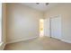 Bedroom with carpet, closet and a ceiling fan for enhanced comfort at 212 Terranova Blvd, Winter Haven, FL 33884