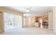 Spacious open floor plan featuring access to kitchen, pool, and backyard at 212 Terranova Blvd, Winter Haven, FL 33884
