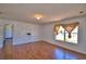Bedroom featuring neutral walls, laminate floors, a window, and a closet at 2209 Pecos Ct, Poinciana, FL 34759