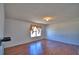 Bedroom featuring neutral walls, laminate floors, a window, and a closet at 2209 Pecos Ct, Poinciana, FL 34759