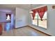 The dining room has tile floors and natural light at 2209 Pecos Ct, Poinciana, FL 34759