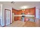 Kitchen with stainless appliances, and tile floors at 2209 Pecos Ct, Poinciana, FL 34759