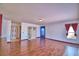 Spacious living room with hardwood floors and natural light at 2209 Pecos Ct, Poinciana, FL 34759
