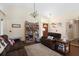 Comfortable living space with hardwood floors, plush seating, and natural light at 2645 Debany Rd, Kissimmee, FL 34744