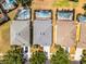 Aerial view showcasing a house with a backyard pool and nearby homes at 2712 Lido Key Dr, Kissimmee, FL 34747