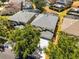 Beautiful aerial view of home showing well-manicured lot, mature trees, and proximity to neighborhood amenities at 2712 Lido Key Dr, Kissimmee, FL 34747