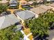 Aerial view of property highlighting backyard pool and proximity to neighborhood amenities and well-maintained streets at 2712 Lido Key Dr, Kissimmee, FL 34747