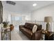 Upstairs loft with white railings, comfortable seating, and ample natural light at 2712 Lido Key Dr, Kissimmee, FL 34747