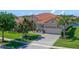 Delightful single-story home featuring a beautiful tile roof and well-maintained landscaping at 2721 Swoop Cir, Kissimmee, FL 34741