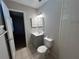 The bathroom offers a walk-in shower, a vanity with a sink, and a mirrored medicine cabinet at 2813 Calico Ct, Orlando, FL 32822