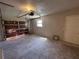 A spacious garage with an automatic door and window for natural lighting at 2813 Calico Ct, Orlando, FL 32822