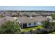 This home features a fenced backyard and screened lanai at 308 Buchannan Dr, Davenport, FL 33837