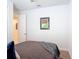 Inviting bedroom featuring a comfy bed and neutral decor, creating a tranquil and relaxing atmosphere at 308 Buchannan Dr, Davenport, FL 33837