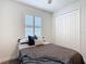 Inviting bedroom with a comfortable bed, soft pillows, and a serene ambiance for restful nights at 308 Buchannan Dr, Davenport, FL 33837