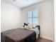 Cozy bedroom with a comfortable bed, soft pillows, and a serene ambiance for restful nights at 308 Buchannan Dr, Davenport, FL 33837