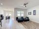 Spacious living room with a dining area and view of the outdoors at 308 Buchannan Dr, Davenport, FL 33837