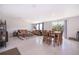 Spacious open floorplan living room and dining room area with tile flooring at 3134 Viceroy Ct, Poinciana, FL 34759