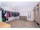 Large walk-in closet featuring built-in shelving, ample hanging space and carpeted flooring at 3134 Viceroy Ct, Poinciana, FL 34759