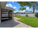 Beautiful fenced backyard with a screened lanai and lush green grass at 3220 Harpers Ferry Ct, Orlando, FL 32837