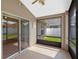 Screened-in lanai with tiled floor and a view of the lush backyard at 3220 Harpers Ferry Ct, Orlando, FL 32837