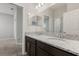Granite countertop, dual sinks, and a shower inside an updated bathroom at 4026 Ruby Run, Haines City, FL 33844