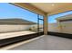 A covered patio with tiled floors and views of the backyard at 4026 Ruby Run, Haines City, FL 33844