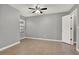 This bedroom features neutral walls, a window for natural light, and tile flooring at 420 Forestway Cir # 108, Altamonte Springs, FL 32701