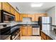 Updated kitchen featuring stainless steel appliances, tile floors and plenty of counterspace at 420 Forestway Cir # 108, Altamonte Springs, FL 32701