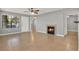 Inviting living space featuring tiled floors, a cozy fireplace, and doorways to other rooms at 420 Forestway Cir # 108, Altamonte Springs, FL 32701