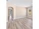 Spacious living room featuring hard wood floors and neutral paint at 4579 Westgrove Way, Orlando, FL 32808