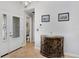 Foyer featuring a decorative glass door and tiled flooring at 4833 Palm Tree Ct, Windermere, FL 34786