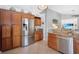 Spacious kitchen showcasing stainless steel appliances and ample cabinet space for storage at 4833 Palm Tree Ct, Windermere, FL 34786