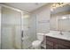Bathroom with tiled shower and glass enclosure with a modern vanity at 510 Fahnstock St, Eustis, FL 32726