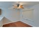 Cozy dining area with a ceiling fan and a large window allowing lots of natural light at 5518 Cretan Way, Winter Park, FL 32792
