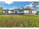 Beautiful new construction home with a well-manicured lawn and craftsman architectural details at 5531 Dallas Blvd, Orlando, FL 32833