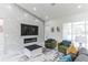 Comfortable living room featuring a fireplace, recessed lighting, and sleek sliding doors to backyard at 5531 Dallas Blvd, Orlando, FL 32833