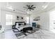 Serene main bedroom with tray ceilings, decorative fan, and herringbone floors for a stylish retreat at 5531 Dallas Blvd, Orlando, FL 32833