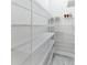 Walk-in pantry with ample metal shelving for organized storage and easy access to supplies at 5531 Dallas Blvd, Orlando, FL 32833