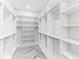 Large walk-in closet with ample shelving and hanging space for optimal organization at 5531 Dallas Blvd, Orlando, FL 32833