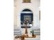Cozy bar area featuring custom cabinetry, stylish decor, and an inviting atmosphere for gatherings with friends and Gathering at 570 Manor Rd, Maitland, FL 32751
