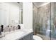 Elegant bathroom with a marble countertop vanity and a glass-enclosed shower at 570 Manor Rd, Maitland, FL 32751